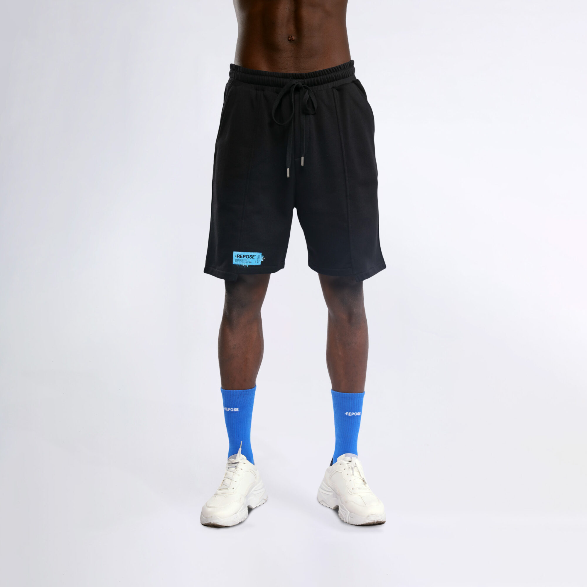 REPOSE Uneven Cut Black Shorts
