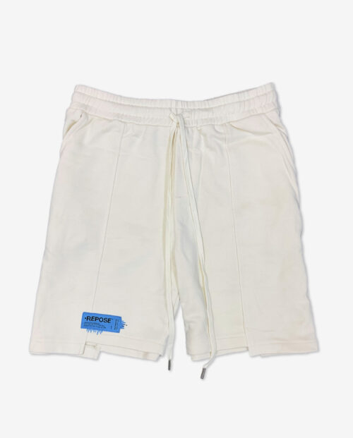 REPOSE Uneven Cut Cream Shorts